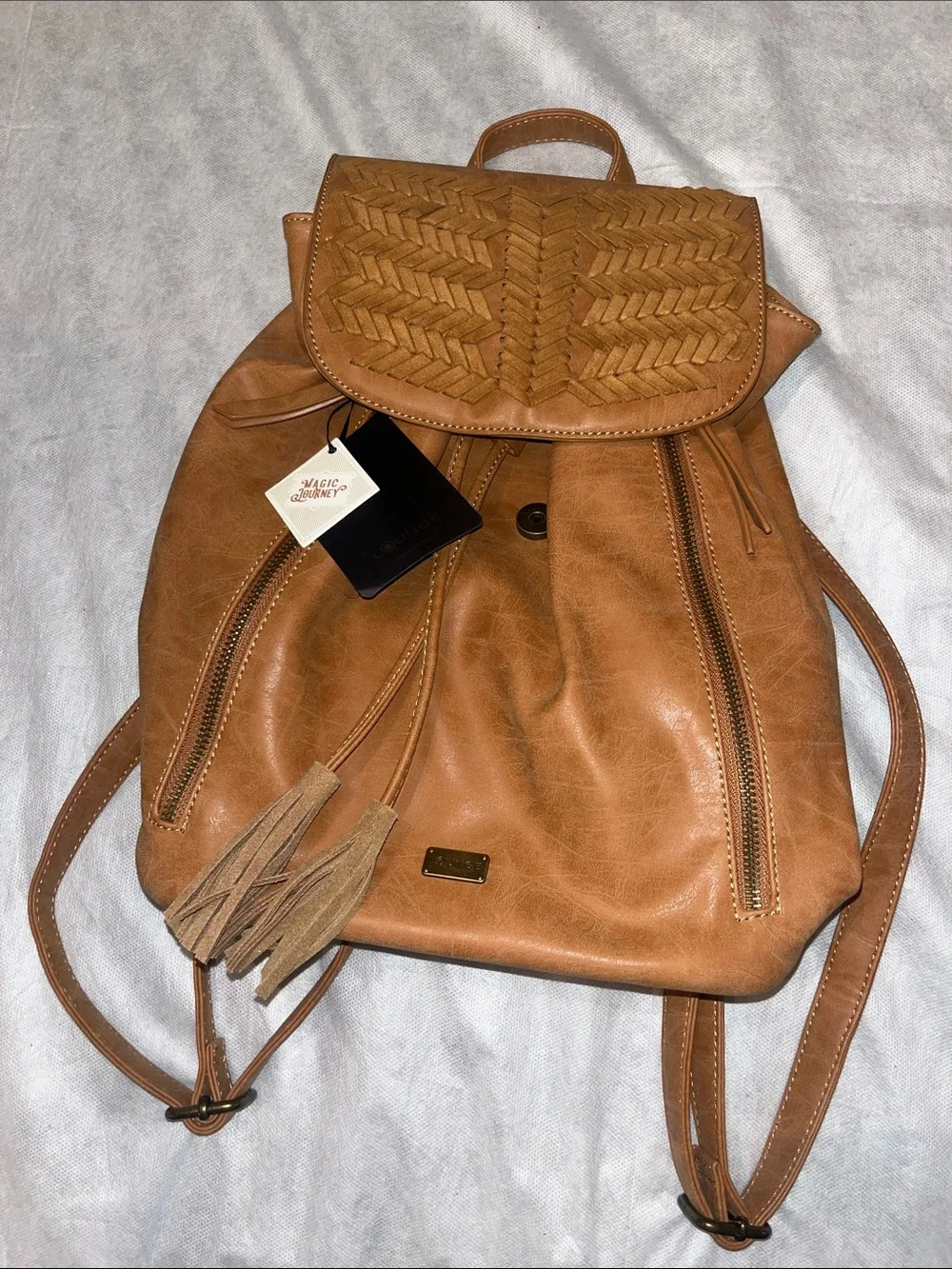 Braided Flap Tan Faux Leather Backpack with Tassel Accents